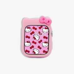 a pink hello kitty case with red bows on it