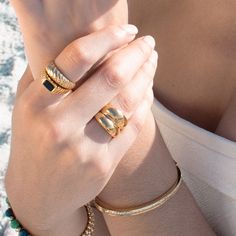 step out of your comfort zone and make an empowering and striking statement with our escapism ring - a chunky, double ring crafted in long-lasting stainless steel for everyday wear. do you dare to stand out from the crowd? 18k gold plated over stainless steel top of band is 15mm thick, base is 5mm Adjustable Dome Ring With Thick Band For Everyday, Adjustable Thick Band Dome Ring For Everyday, Tarnish Resistant Wide Band Ring For Everyday, Gold Thick Band Jewelry For Promise, Adjustable Gold Wide Band Ring For Everyday, Tarnish Resistant Wide Band Open Ring For Everyday, Everyday Tarnish Resistant Wide Band Ring, Gold Wide Band Ring Tarnish Resistant For Everyday, Adjustable Wide Band Jewelry For Promise