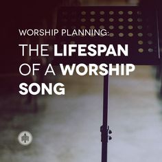 a sign that says worship planning song types in front of an empty room with rows of chairs