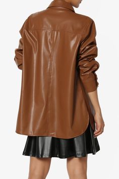 Layer up in the coated finish faux leather shirt. This outer layer can be worn open or buttoned up for extra warmth. Reaching mid-thigh and with long sleeves, you'll be effortlessly stylish every time. Wear with a crop top and denim pants, or leather bottom.Casually-cool vibe of a shirt jacket designed with an easy-to-layer snap buttoned frontPoint collar, Flap chest pockets, Curved hemLong sleeves with button cuffs, Oversized fitFits true to US size, S=Size(4-6), M=Size(8-10), L=Size(12-14), XL Oversized Solid Shacket With Lapel Collar, Chic Relaxed Fit Shacket For Workwear, Trendy Solid Color Shacket For Fall, Fall Solid Single Breasted Shacket, Trendy Brown Shacket For Fall, Trendy Oversized Shacket, Trendy Shacket With Lapel Collar, Oversized Lapel Collar Shacket For Fall, Trendy Oversized Solid Shacket