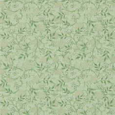 a green wallpaper with small white flowers and leaves on the bottom half of it