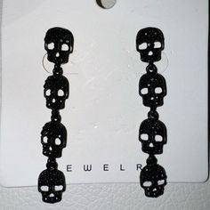 Black Bedazzled Earrings Featuring Four Hanging Akulls. Never Worn. Free With Any Purchase. (Comment That You Would Like This To Be Included In Your Order After Making Your Purchase & I Will Send It Along With The Rest Of Your Order! ** One Free Item Per Order) Skull Print Party Jewelry, Black Skull Earrings For Parties, Punk Skull Earrings For Party, Edgy Skull Earrings For Parties, Bedazzled Skull, Adjustable Black Skull Earrings, Black Gothic Earrings With Skull Print, Handmade Black Skull Earrings, Black Elegant Chandelier Earrings, Nickel Free