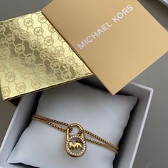 Bnwt - Michael Kors Gold Lock Stainless Steel (Stamped) Slide (Adjustable) Bracelet Detailed With Tiny Crystals Around The Initials. Beautiful! Comes With Signature Gift Box & Care Instructions Booklet! Please See All Photos For Full Description. Tortoise Shell Bracelet, Michael Kors Bracelet, Pave Bracelet, Slide Bracelet, Crystal Logo, Steel Stamp, Michael Kors Jewelry, Crystal Bangle, Instructions Booklet