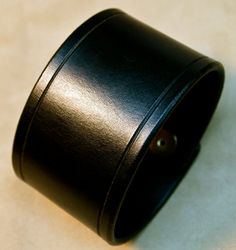 This 2 black American bridle leather cuff is perfectly sized for your wrist. The edges are scribed, beveled, slicked smooth and sealed. 2 high quality hand polished brass snaps provide the closure. Ill need your wrist size for this cuff. Instructions in the pics above! For more info on my work please visit http://freddiematara.com Thx! Freddie LIVE●LOVE♥LEATHER Adjustable Leather Cuff Bracelet For Formal Occasions, Leather Cuff Bracelet For Formal Occasions, Formal Leather Cuff Bracelet, Classic Leather Bracelet With Waxed Finish, Black Leather Cuff Bracelet For Formal Occasions, Formal Black Leather Cuff Bracelet, Elegant Black Leather Cuff Bracelet, Classic Leather Bracelet With Black Band, Classic Black Leather Bracelet For Formal Occasions