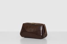 Toiletry Bag | Unisex Bag | Wide opening   - Handmade in Italy  - Full grain Italian leather  - Dim. 26 cm (L) x 15 cm (H) x 10 cm (W) | Capacity 3.9 Lt | Weight 0.27kg   - 12 month warranty   The Otto dopp kit is compact, light and functional, it features 2 ways Ykk zippers that allows you to see everything stashed inside. The perfect travel accessory Crafted in Italy from premium full grain-leather, this lightweight, durable toilet bag features a roomy compartment and three open inner pockets. This toilet bag will accompany you for years to come.  The perfect match for any of our duffles for an awesome travel set. The branded Republic of Florence dust cover will help protect your bag from dust and mold while it is being stored. Built to Last:  - Italian full grain calf-skin leather - Dur Brown Rectangular Travel Accessory With Removable Pouch, Versatile Brown Box Bag For Travel, Brown Travel Box Bag Rectangular Case, Brown Travel Box Bag, Modern Brown Rectangular Travel Accessories, Brown Pouch Box Bag For Travel, Modern Portable Brown Bag, Modern Brown Cosmetic Bag For Everyday Use, Modern Brown Cosmetic Bag