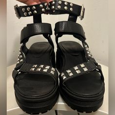 Never Worn Black Size 9 Chunky Low Platform Sandals. Studded Details Middle Strap Is Velcro,Ankle Strap Buckles Punk Sandals With Buckle Closure And Round Toe, Punk Style Sandals With Round Toe For Concerts, Summer Punk Sandals With Round Toe, Black Punk Sandals With Round Toe, Trendy Round Toe Sandals For Concert, Punk Style Sandals For Summer Concerts, Summer Concert Heels With Round Toe, Platform Sandals With Round Toe For Concert, Punk Leather Sandals For Summer