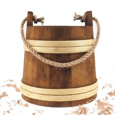 a wooden bucket with rope around it