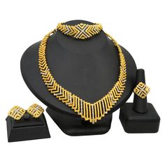 Indian Gold Plated Jewelry Sets Wedding Dubai Choker Necklace Bracelet Earring Ring Nigerian Bridal Set African JeweleryModel Number:1005003058985413 (1) Necklace approx :43cm +5cm. Bracelet approx :19.2cm .One set includes 1 Necklace,1 Bracelet,a pair of Stud Earrings and a Ring. (2) When you go to a banquet, necklace suit will match your dress very well, highlighting your temperament; when you go to a dance party, it will make you look more mature. (3) The jewelry set is packed with a box.Ideal gift to Lover,Girlfriend,Wife,Mother,Daughter,Fiancee;And perfect for Wedding, Prom, Mother of the Bride, Pageants, Homecoming,Engagement Parties, Birthdays and Other Special Occasions. (4) Gold plated Zinc metal alloy , Nickel & Lead Free, Harmless and hypoallergenic for skin. Wedding Jewelry Sets With Plating, Formal Plated Metal Jewelry, Formal Metal Plated Jewelry, Wedding Jewelry Sets With Plated Cubic Zirconia, Wedding Cubic Zirconia Plated Jewelry Sets, Round Plated Jewelry For Wedding, Plated Round Jewelry For Weddings, Anniversary Costume Jewelry Plated, Anniversary Costume Jewelry, Plated