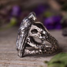 "Crow sitting on a tree ring in sterling silver. Crow as a totem animal is the keeper of sacred law, can see beyond illusion of the physical world and can \"shape shift\". As a guide crow teaches personal integrity, to speak your truth, walk your talk and be truthful to yourself. In creating this ring I was inspired by the mysterious nature of crow that seem to know more than what is on the surface. In the design of the ring I placed the crow on tree twigs and branches, inspecting and watching. Crow Ring, Crow Sitting, Raven Ring, Silver Bird Ring, Witch Ring, Witch Rings, Personal Integrity, Totem Animal, Bird Ring