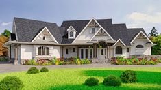 a large white house sitting on top of a lush green field