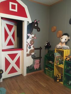 a child's room with farm animals painted on the walls and wooden flooring