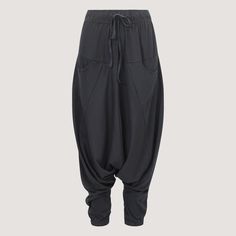 These super-soft classic jersey harem pants will be the cosiest pants you will ever own. Boasting a relaxed fit they are perfect for everyday comfort. Styled with cuffs to keep the legs well and truly in place, an adjustable waistband and two front handy pockets. Popular for yoga, working from home, maternity and travels. ⚬ Harem pants ⚬ 95% Bamboo, 5% Elastane ⚬ Two pockets ⚬ Length 106cm ⚬ Free size 10-18 ⚬ Drawstring waistband ⚬ Machine washable ⚬ Handmade in India Have a question? Please mes Sari Skirt, Handkerchief Hem Dress, Comfy Clothing, Harem Trousers, Bamboo Clothing, Soft Classic, Block Dress, Jumpsuit Black, Printed Trousers