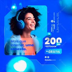 a woman with headphones is smiling and looking at the camera in front of a blue background