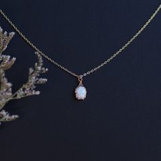 Handmade item Materials: 14k Gold Plated Gemstone: Lab Created White Opal Jewelry type: Necklace Style:  Minimalist Description *Necklace Length : 14inches/16inches/18inches/20inches *Pendant Dimensions : 7mm X 9mm *Chain Thickness : 1.3mm 🌻Tips on Caring for Jewelry: - If you want your jewelry to look new at all times please take jewelry off before showering. - Please keep it away from chemicals, water, and high temperature, it can be too harsh for your stone. - Store it well. A ring box or airtight ziplock bag is the perfect place to keep them. Do not hesitate to contact me with any doubts, I will be happy to help you!  : ) CHECK MORE JEWELRY https://www.etsy.com/shop/CaitlinsJewelryHouse?ref=seller-platform-mcnav Thank you for visiting my shop! Dainty Gemstone Necklace, Stone Store, Women Healing, October Birthstone Necklace, Necklace Opal, Ziplock Bag, Jewelry Dainty, Ziplock Bags, October Birthstone