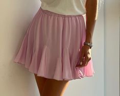 Summer Short Ruffled Mini Skirt, Summer Ruffled Short Mini Skirt, Summer Short Stretch Skirt, Summer Stretch Skirt Short Length, Summer Skirt Shorts With Built-in Shorts, Summer Skirt-style Shorts With Elastic Waistband, Summer Stretch Skirt In Short Length, Short Pleated Skirt For Summer, Short Ruffled Skort For Summer