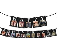 a happy anniversary banner with photos hanging from it