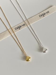 Introducing our Minimalist Gold/Silver Bean Pendant Necklace, a piece that masterfully blends minimalist design with a whimsical touch. This dainty necklace is meticulously crafted from 925 sterling silver, available in two stunning finishes - a radiant 18k gold and a sleek silver. At the heart of this simple necklace is a charming bean-shaped charm, creating an eye-catching statement that adds a dash of modern sophistication to the minimalist gold or silver chain. The necklace, as waterproof as Recycled Necklaces, Necklace Simple, Simple Necklace, Perfect Gift For Her, Dainty Necklace, Necklace Gift, Best Friend Gifts, Gift Necklace, Charm Necklace