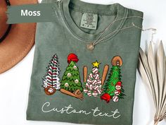 Celebrate the season in sporty style with this Personalized Christmas Baseball Tee! Perfect for baseball lovers, this holiday-themed shirt combines your love for the game with festive cheer. Whether you're watching the game or attending holiday events, this Baseball Xmas Shirt makes an ideal Christmas gift for fans of America's favorite pastime. Stay cozy and stylish with this must-have Baseball Christmas Tee! 👉 Unisex Comfort Colors® 1717 T-shirt Comfort Colors introduces its garment-dyed t-sh Christmas Baseball Art, Christmas Baseball Shirt, Custom Print T-shirt For Baseball Season, Cotton Graphic T-shirt For Baseball Season, Cotton Graphic Print T-shirt For Baseball Season, Baseball Christmas, Gifts For Baseball Lovers, Baseball Gifts, Xmas Shirts