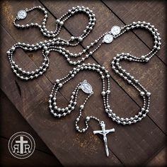 Historical 1916 WWI Service Combat Rosary design 15 or 20 Decades for the serious Prayer Warrior Italian Silver finish Crucifixion Nails Crucifix Italian Miraculous centerpiece - Beautiful Quality Strong construction handmade in our studio Beautiful Silver finish chains are a no tangle design Double looped Split ring connectors so rosary won't pull apart Optional medals may be added (up to 4) Over 5000 5-Star ⭐⭐⭐⭐⭐ Reviews Includes a Free Round Zipper Pouch This all metal rosary is rugged, funct Round Zipper Pouch, Crucifixion Nails, Combat Rosary, Rosary Design, Rugged Rosary, Paracord Rosary, Knights Of Columbus, Rosary Catholic, Prayer Warrior