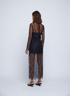 The Priscilla Dress in Black Lace by Anna Quan is a long sleeve maxi dress crafted in a sheer lace with natural hem, deep side split, and elongated sleeves. Black, removable slip included. Regular fit 100% Nylon STYLE 40.56.BLA2 Striped Scarves, Dress Home, Lace Dress Black, Dress Crafts, Long Sleeve Maxi, Mid Dresses, Engineered Garments, Gender Female, Sheer Lace