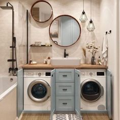 a washer and dryer in a small bathroom