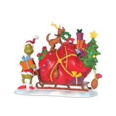 an image of a christmas sleigh ornament with presents on the sled