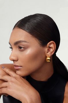 These gold chunky hoop earrings add a touch of chic to any look. Perfectly minimalistic, waterproof, and tarnish-free, these beauties make a great go-to statement earrings. Made of hollow + lightweight metal and dipped in thick gold plating, these earrings are perfect for everyday wear! ………………………………….D E T A I L S• Materials: Stainless steel, 18k gold plating• Hoop Diameter: 2.3cm (0.8 inches) • Hoop Width: 1.8cm (0.7 inch)• This product is hypoallergenic, waterproof and tarnish resistant Contemporary Fine Jewelry, Chunky Hoop Earrings, Modern Muse, Minimal Jewelry, Jewelry Photography, Jewelry Branding, Jewelry Care, Gold Plating, Statement Earrings