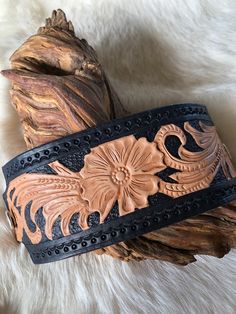 Hand Tooled Genuine Leather Cuff Bracelet.  Hand tooled in Texas Workshop.  Bracelet is offered in 3 sizes to fit both men and women.  Snap closure firmly secures bracelet on your wrist. Cool Mens Bracelets, Leather Gifts For Her, Handmade Leather Jewelry, Leather Tooling Patterns, Tooling Patterns, Leather Wristbands, Leather Accessory, Leather Cuff Bracelet, Hand Tooled Leather