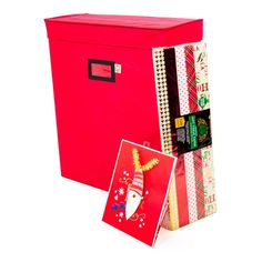 a red storage box with christmas wrapping on it and a card in the bottom right corner