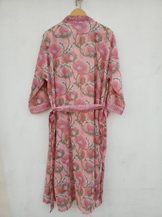 This Robe we makes from 100% Cotton printed fabric. The fabric print is Dragon Print which is very popular in all over the world . We use pure cotton cambric fabric . This is free size robe . Length = 120 cms ( 48 inch) Pink Printed Dress For Loungewear, Summer Long Sleeve Block Print Sleepwear, Pink Beach Dress With Printed Motifs, Casual Printed Dresses For Home, Beachwear Cotton Kimono With Print, Printed Cotton Beachwear Kimono, Beach Cotton Robe With Floral Print, Cotton Floral Print Robe For The Beach, Pink Cotton Vacation Robe