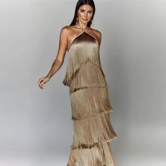 Turn heads with the Tiana Maxi Dress, a metallic, backless beauty with tassel halter neckline. Perfect for glamorous evenings. Long Fitted Dresses, Backless Evening Dress, Party Kleidung, Maxi Dress Party, Metallic Colors, Outfit Casual, Elegant Woman, Casual Outfit, Evening Dress