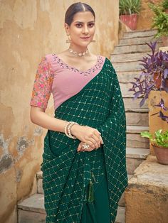 <ul>
<li style="text-align: justify;">One of the most delicate and feminine forms of saree with this dazzling green-colored initiated of Chinon material decorated with all-over sequins and threadwork and also has piping on the edge.</li>
<li style="text-align: justify;">This pretty saree is paired with a dusty pink colored blouse in Chinon material produced with sequins and thread work and also has a half sleeve with sequins works Revitalizes your luxurious senses by wear Chinon Saree, Sequence Fabric, Dark Green Blouse, Blouse Saree, Sequence Work, Lehenga Saree, Sharara Set, Work Sarees, Chiffon Saree