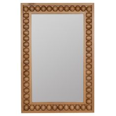 a wooden frame mirror with balls on the bottom and sides, against a white background