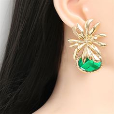 Add a touch of sparkle to your outfit with these elegant 18k gold-plated earrings featuring dazzling crystal that are sure to send compliments your way. 1.97" W x 2.36" L 18k gold-plated copper / crystal Gold Crystal Flower Shape Earrings For Parties, Gold Oval Crystal Earrings For Party, Copper Crystal, Flower Drop Earrings, Green Oval, Flower Plates, Your Outfit, Gold Plated Earrings, Cubic Zirconia