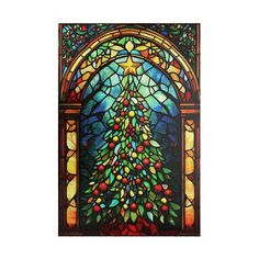 a stained glass window with an image of a christmas tree