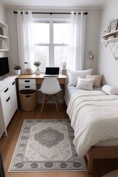 a bed room with a neatly made bed and a laptop on a desk next to a window