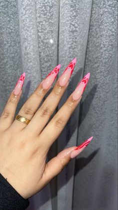 Long Oval Valentines Nails, Valentines Nail Set Almond, Valentines Stilletos Nails, Valentines Nails Acrylic Stiletto, Long Almond Valentines Nails, Long Almond Nails Valentines Day, Stilleto Nails Pink And Black, Heart Flames Nails, Almond Valentines Nails Pink