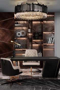 an elegant desk with a chandelier hanging from it's ceiling, surrounded by bookshelves