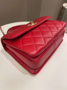 Chanel Trendy Cc Flap BagRed Stiff Lambskin LGHWSmall 25 x 17 x 11 cmChain drop 49.5 cm29 Series Aug 20209.5/10 Excellent (faint rubs at base and minor lines under flap otherwise almost like new)Includes dust bag, ation card and receiptRTP current 9910 sgdPrice was 5900 sgdPrice now 5400 sgd 4020 usd CN5350-01 Classic Red Shoulder Bag With Cc Turnlock Closure, Red Designer Bag With Double Flap, Red Designer Bags With Double Flap, Designer Red Double Flap Bag, Red Formal Bags With Double Flap, High-end Red Business Bag, Luxury Red Shoulder Bag With Cc Turnlock Closure, Red Leather Shoulder Bag With Cc Turnlock Closure, Red Luxury Flap Bag For Formal Occasions