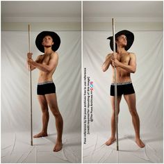 a man with no shirt holding a pole and wearing a black hat while standing in front of a white backdrop