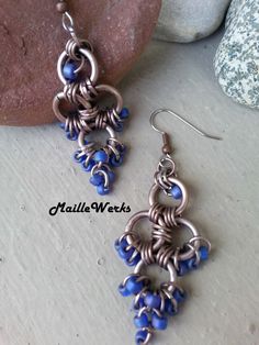 Bronze and Cobalt Chainmaille Earrings, Anodized Aluminum Chainmaille Earrings, Modern Earrings, Art Jewelry, Chain Mail Earrings by MailleWerks on Etsy Handmade Blue Beaded Metal Earrings, Blue Metal Beaded Earrings Wire Wrapped, Blue Wire Wrapped Beaded Metal Earrings, Blue Wire Wrapped Chandelier Earrings, Blue Metal Chandelier Earrings With Dangling Beads, Blue Wire Wrapped Dangle Chandelier Earrings, Blue Teardrop Wire Wrapped Chandelier Earrings, Blue Metal Beaded Earrings For Pierced Ears, Blue Metal Chandelier Earrings With Ear Wire