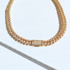 Get ready to sparkle with our Diamond Cuban Link Necklace. The perfect gift for a special someone, or simply treat yourself to some bling! An elegant, unique piece that many women would love to add to their collection. ✔Hypoallergenic ✔Quality Guaranteed ✔Handmade Size: 10mm width Material:18k gold plated, high quality CZ stones Cubic Zirconia Chain Link Necklaces As A Gift, Chain Link Jewelry With Diamond Accents For Gift, Gift Cuban Link Chain Necklace With Cubic Zirconia, Cuban Link Cubic Zirconia Chain Necklace Gift, Dazzling Gold Necklace, Crystal Cuban Link Chain Necklace As Gift, Crystal Cuban Link Necklace For Gift, Crystal Chain Link Necklaces For Gifts, Crystal Chain Link Necklaces As Gifts