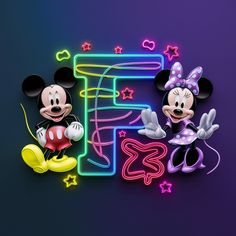 mickey and minnie mouse standing next to each other in front of the letter f with neon lights