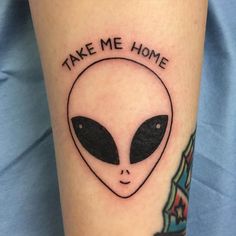 an alien tattoo with the words take me home on it