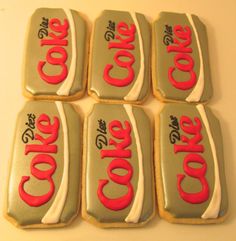 six cookies with the word coke on them