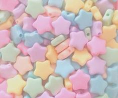 small pastel colored stars are scattered together