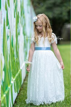 FLOWER GIRL DRESSES 10% OFF - DISCOUNTED IN CART 😍 PLUS FREE SHIPPING ON ALL ORDERS $100 UP The perfect fairytale wedding flower girl dress. This pretty whimsical style White Lace Flower Girl dress features a soft stretch lace bodice and a feathered lace V-back with a full length tulle skirt. Dress is lined and perfect for your flower girl dress, communion dress, baptism dress, birthday dress or special occasion. Beautiful for photoshoots and portraits The perfect flower girl dresses for bohemi Blue And White Flower Girl Dresses, Dusty Blue Flower Girl Dress, Flower Girl Dresses White, Flower Girl Dresses Lace, Yellow Flower Girl Dresses, Bohemian Flower Girl Dress, Bohemian Flower Girl, Dance Portraits, Burgundy Flower Girl Dress