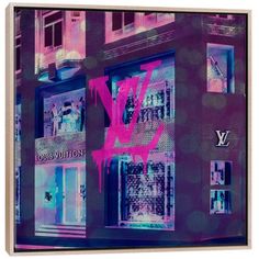 the louis vuitton store front with pink and blue paint splattered on it