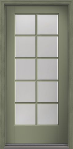 an empty green door with glass panels