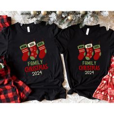 🎄Get into the holiday spirit with our personalized family 3 Stocking Christmas t-shirts! Add a touch of uniqueness to your festive wardrobe by customizing each stocking with a name of your choice! Crafted from lightweight Bella Canvas tees, these shirts offer both comfort and style, making them perfect for family gatherings, Christmas parties, and holiday photos. Plus, enjoy the added convenience of free shipping on your order. Make this holiday season truly memorable with personalized shirts f Customizable Cotton Christmas T-shirt, Customizable Crew Neck Christmas T-shirt, Customizable Christmas T-shirt, Red Family Matching Holiday T-shirt, Red Family Matching T-shirt For Holidays, Family Holiday T-shirt With Letter Print, Family Holiday Letter Print T-shirt, Holiday Letter Print T-shirt, Christmas Names